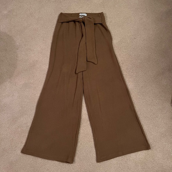 Urban Outfitters Pants - Urban Outfitters high waisted tied brown flare sweater stretchy trousers size XS